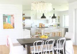 Right outside this charming cottage, beach access is only a short five minutes north or south at either depoe bay's state waysides parks. Reclaimed Wood Table With White Cafe Chairs Cottage Dining Room