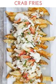 Learn How To Make Crab Fries These Baked Fries Are Loaded With Cheese Garlic Yogurt Sauce Green Onions Easy Seafood Seafood Dinner Seafood Appetizers Easy