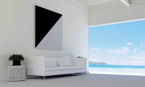 Greek key curtains hang behind a black and white zebra print accent chair topped with a green pillow and placed beside a brass hairpin accent table. 61 Gorgeous Black And White Living Room Ideas Home Decor Bliss