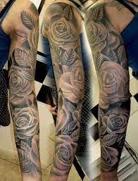 Black And White Roses Sleeve Tattoo Tattoo Ideas And Inspiration Floral Tattoo Sleeve Rose Tattoo Sleeve Sleeve Tattoos