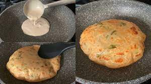 Wheat Flour Garlic Paratha Recipe With Liquid Dough In 5 Mins No Rolling No Kneading Paratha Yout In 2021 Vegetarian Snacks Recipes Paratha Recipes Nashta Recipe