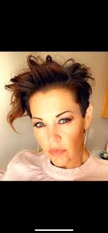 Looking for a stylist in Loveland that can do a feminine, short hair cut.  TIA.