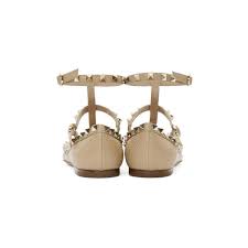 No valentino garavani shoes edit would be complete without the signature rockstuds; Valentino Tan Valentino Garavani Rockstud Cage Ballerina Flats Valentino