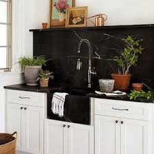 The cairn bar sink is made of kohler neoroc, a. Honed Black Marble Countertops Design Ideas