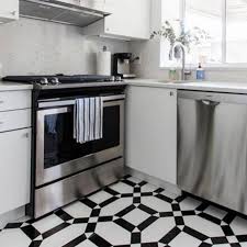 Another great kitchen floor tile idea is the installation of a medallion. How To Choose The Perfect Kitchen Floor Tile Tileist By Tilebar