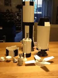 It consisted of three stages, each fueled by liquid propellants. Painting Rockets
