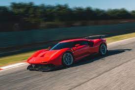 A striking wedge shape dominates the view of the car's side at the front end. The Ferrari P80 C Is A Track Only Homage To 1960s Prototypes