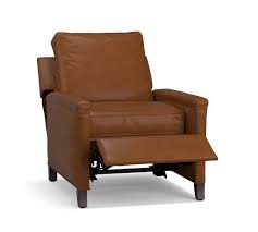 The sophisticated profile of the tyler leather recliner features details like end caps on the square arms and square legs that complement the graphic frame. Tyler Leather Square Arm Power Recliner Pottery Barn