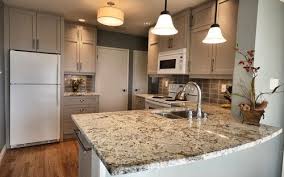 Nice Small Kitchen With Benjamin Moore Thunder Cabinets Mount Saint Anne On The Walls Kitchen Remodel Countertops White Kitchen Appliances White Appliances