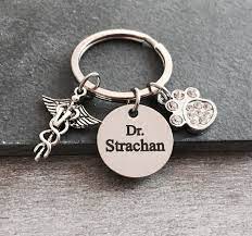 I love veterinary store has amazing gifts for veterinarians! Veterinarian Vet Doctor Grad Graduation Gifts For Vet Keychain Veterinarian Keychain Veterinarian Gift Silver Keychain Customized Gifts For Veterinarians Doctor Gifts Silver Keychain