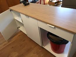 A repurposed wood top and shiplap sides completes the cabinet with farmhouse style. Knoxhult Hack Ikeahacks