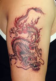 Black ink chinese dragon with flowers tattoo design by derrick castle. Red Fire Dragon Tattoo Ideas Center