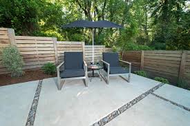 Find over 100+ of the best free concrete texture images. Backyard Sitting Area With Concrete Pavers And Modern Wood Fence Hgtv