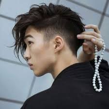 Long braided ponytail with undercut. 15 Edgy And Bold Undercut Haircuts For Men Styleoholic