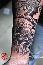 Like this one with the wizard casting a spell from a book. Demon Wizard By Lokesh Tattoonow