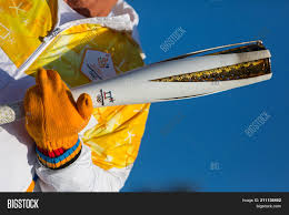The first time it rained. Winter Olympics Torch Image Photo Free Trial Bigstock