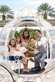 This Adorable Family Takes A Ride In Cinderella S Coach After A Vow Renewal At Walt Disney World Disney Fairy Tale Weddings Disney Wedding Disney World Wedding