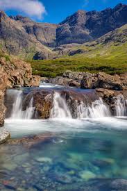 Fairy Pools In Isle Of Skye Scotland Fairy Pools Beautiful Places To Travel Isle Of Skye