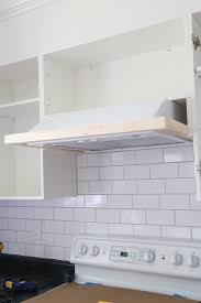 Wood mullion and clear beveled glass doors. Diy Range Hood Cover Angela Marie Made