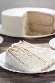 White Wedding Cake Delicious White Cake With White Buttercream Icing Tastes Like An Old Fashioned Whi Wedding Cake Recipe White Wedding Cake Recipe Desserts
