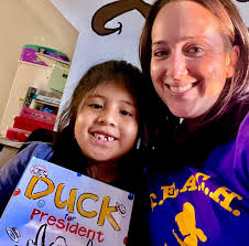 Highland Park Elementary School held their annual TEACH event earlier this  week, as teachers visited students' homes to read a story, and gift two  books and a library card application with the