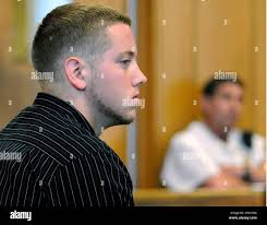 Aaron Deveau, 18, listens to prosecutor Ashlee Logan during his trial in  Haverhill District Court, Tuesday, May 29, 2012, in Haverhill, Mass. Deveau  is first person to be tried in Massachusetts on