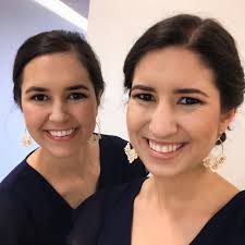 Spotted! Two beautiful bridesmaids, Katie Kneece and Anna Strauss, in our  Leather Flower Earrings! Available in three colors