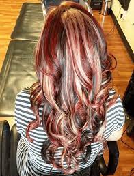 The dark brown hair with red ribbons looks amazing. 60 Brilliant Brown Hair With Red Highlights