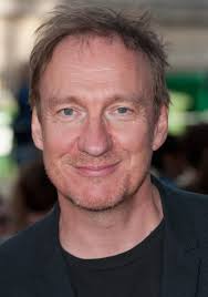 David thewlis was born david wheeler in 1963 in blackpool, lancashire, to maureen (thewlis) and alec raymond wheeler, and lived with his parents above their combination wallpaper and toy shop during his childhood. David Thewlis Disney Wiki Fandom