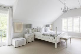 In a bedroom, it's good to layer your lighting throughout the room. White Bedroom Decorating Ideas