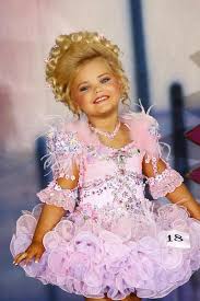 A Cupcake Dress Is A Short Pageant Dress Worn By A Contestant Typically Under The Age Little Girl Pageant Dresses Toddler Pageant Dresses Baby Pageant Dresses