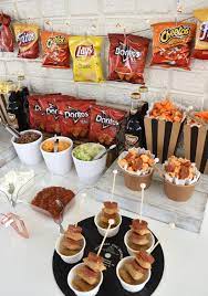 If you are looking for a great way to 'spice up' a kid's party, consider setting up a taco bar. Create A Walking Taco Bar For Your Next Celebration Walking Taco Bar Ideas Graduation Party Foods Party Food Bars Party Food Buffet