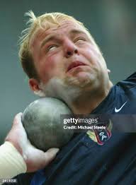 John Godina of the USA in action during the men's shot put final at... News  Photo