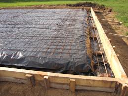 Forming Vapor Barrier And Steel For Monolithic Slab Pour Pouring Concrete Slab New Home Construction Rammed Earth Homes