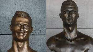 Perhaps the sculptor of cristiano ronaldo's statue is a bit fond of madeira wine? Cristiano Ronaldo Mocked Statue At Madeira Airport Is Replaced Bbc Sport