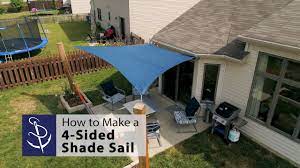 For our diy shade sail installation, i planned on attaching one side of the sun shade sail to the house, and the other side of the shade sail to two wooden poles. How To Make A 4 Sided Shade Sail Youtube