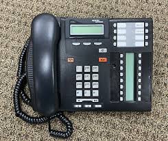 Use the three button label strips on the telephone to show what is programmed on the buttons. Business Phone Sets Handsets Nortel Networks T7316e Phone