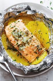 The fish is baked in between layers of onion, carrots, celery, peppers, tomatoes and fresh herbs. 11 Healthy Fish Dinner Recipes Eatwell101
