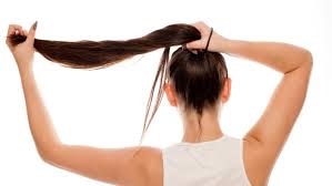 But again, if you want it to be straight across or straighter across, you're going to want to bring these rubber bands up a little bit shorter and they're going to help it to be a little bit straighter. How To Cut Long Hair At Home Without Ruining It Reviewed