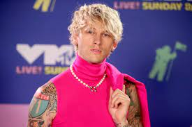 Rapper machine gun kelly tattoo jewelry detail attends. Machine Gun Kelly Shows Off Gruesome New Neck Tattoo