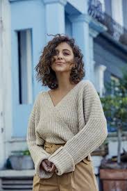 Haircuts for naturally curly hair are always in style, after all, not every woman wants to spend her precious morning time fussing with a blow dryer. Curly Haircuts For Round Faces All Things Hair Us