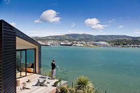 Set on a sloping site in a suburban environment overlooking nelson city, the harbour and mountains beyond, it is within walking and cycling distance to work and the town centre. House With Port Views The Design Guide