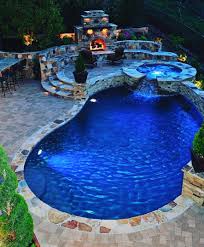 This Backyard Has A Space For Every Season A Pool And Outdoor Dining Area For Spring And Summer And Fireplace Pool Im Garten Pool Ideen Hinterhof Pool