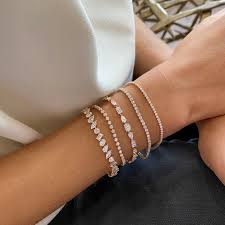 Various metals (platinum and 14k white, yellow, and rose gold), with diamonds available in two grade classes: Diamond Tennis Bracelet 3 00 Carats Material Good