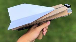 A piece of office paper. How To Make Paper Airplane Launcher From Cardboard Youtube