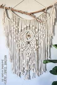 I made a few different versions of mini wall hangings. Eye Of The Storm By Andrea Hannibal Create Express Transform Driftwood Macrame Macrame Wall Hanging Patterns Macrame Wall Art