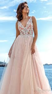 A marital dress, typically all white and decorated with frills and veils. Wona Concept Vencanice