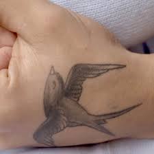 Maybe you would like to learn more about one of these? What Does Your Swallow Tattoo Say About You Self Tattoo