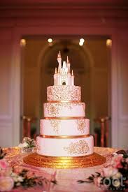 Four Layer White And Gold Wedding Cake With Cinderella Castle On Top Root Weddings Disney Wedding Cake Princess Wedding Cakes Fairy Tale Wedding Cake