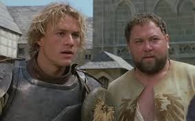 Paul bettany as geoff chaucer; A Knight S Tale 2001 Starring Heath Ledger Rufus Sewell Shannyn Sossamon Paul Bettany Laura Fraser Mark Addy Alan Tudyk B R Nice Bejo Directed By Brian Helgeland Movie Review